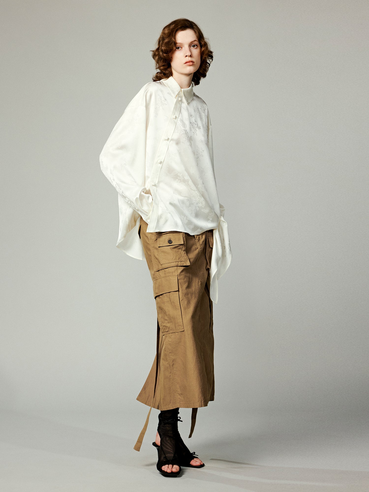 Modern chinese-style embroidered button shirt with tie hem detail