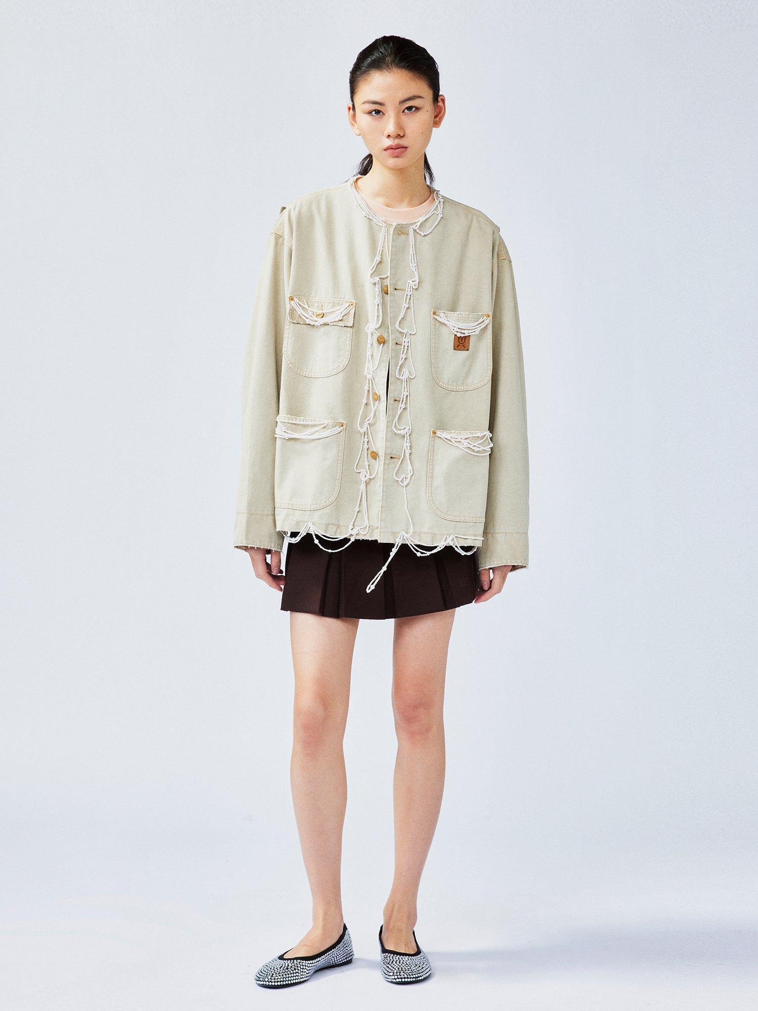 Elegant and lively pearl chain Michigan jacket