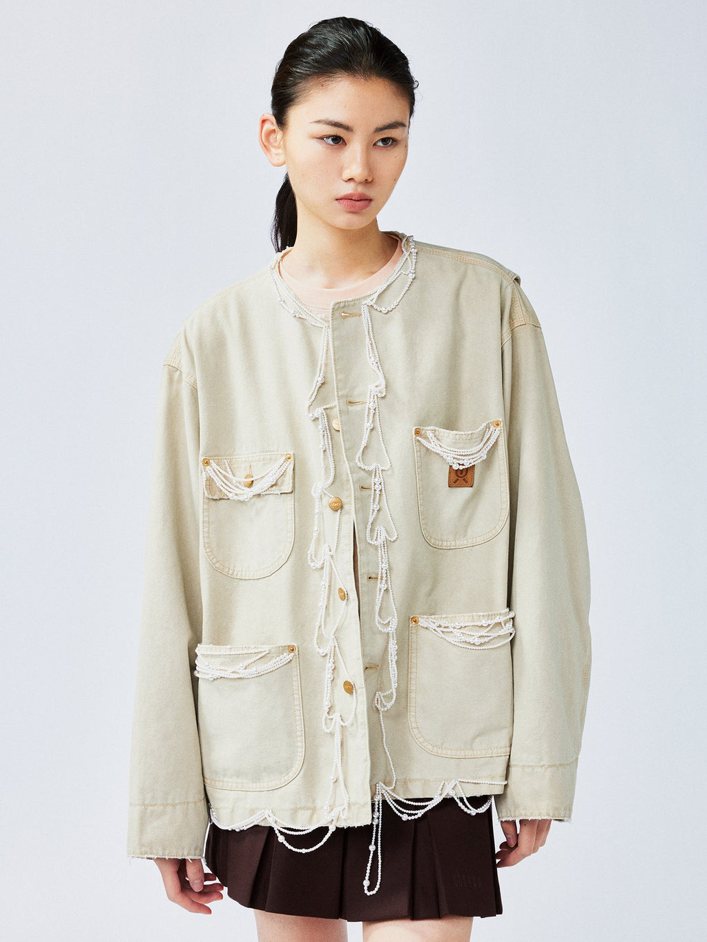 Elegant and lively pearl chain Michigan jacket