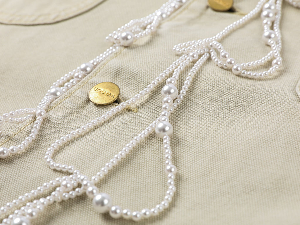 Elegant and lively pearl chain Michigan jacket