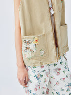 Nostalgic workwear vest with playful patchwork