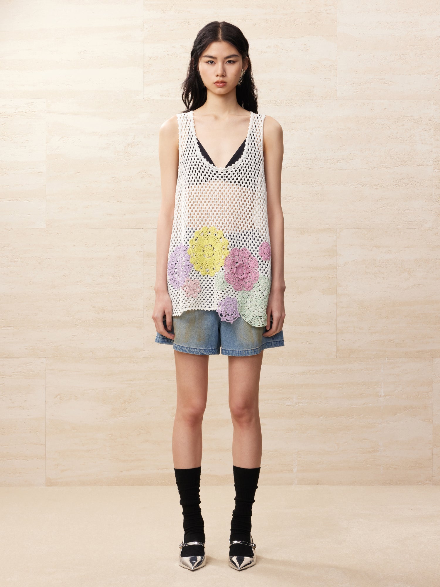 Oversized knitted crochet floral vest