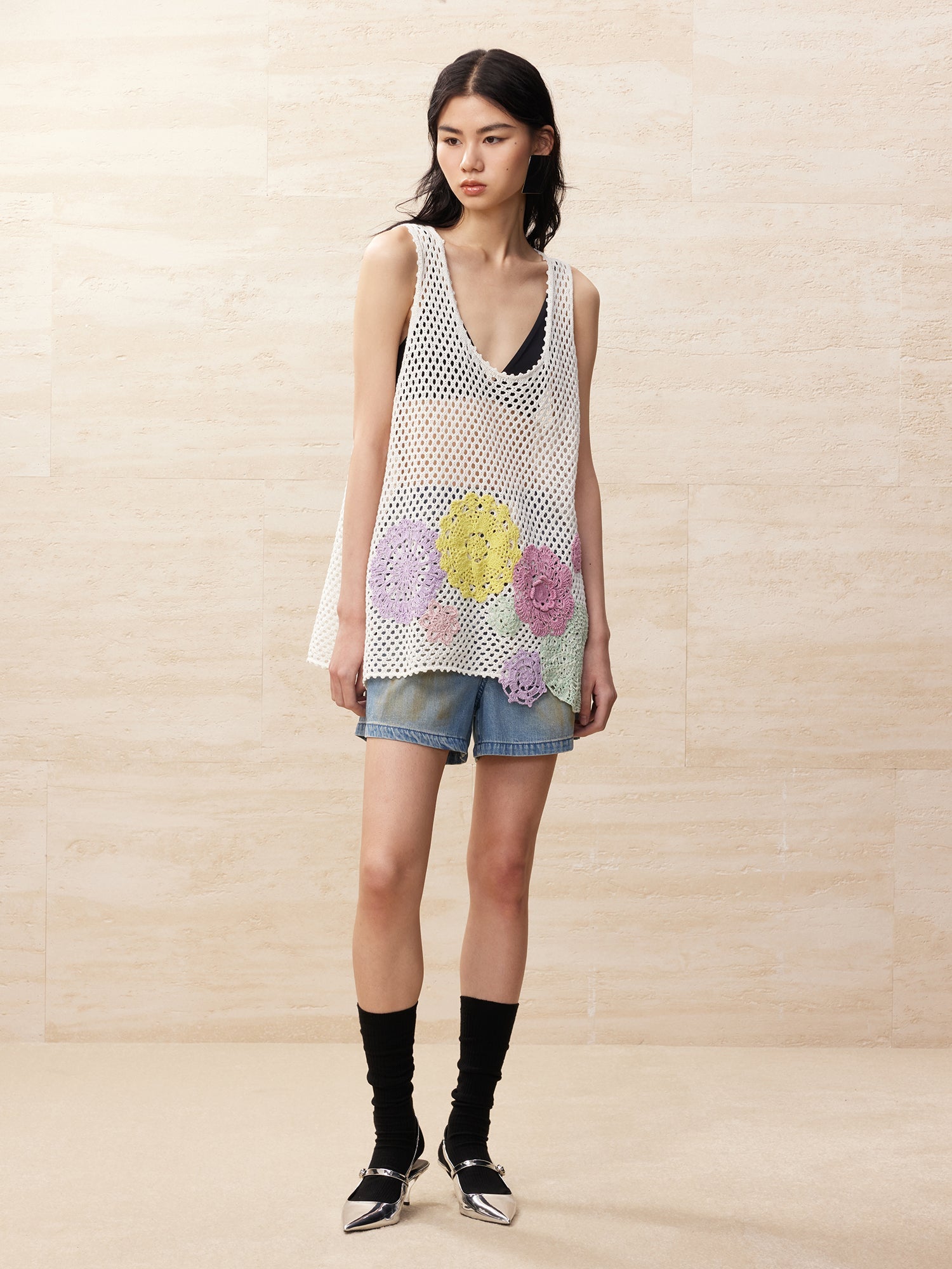 Oversized knitted crochet floral vest