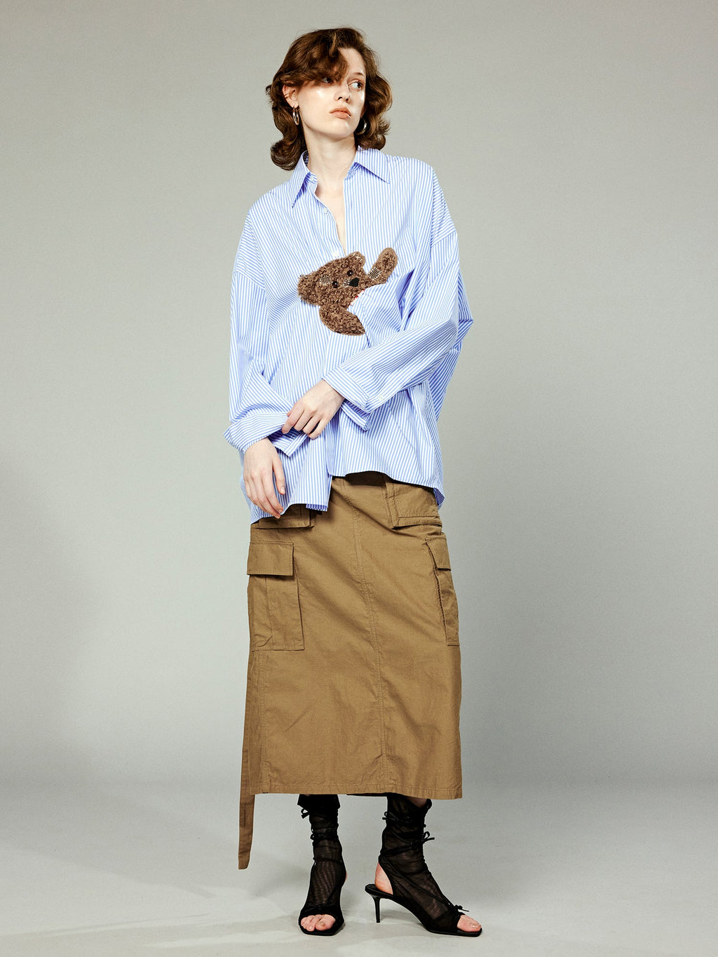 Playful teddy bear pinstriped shirt