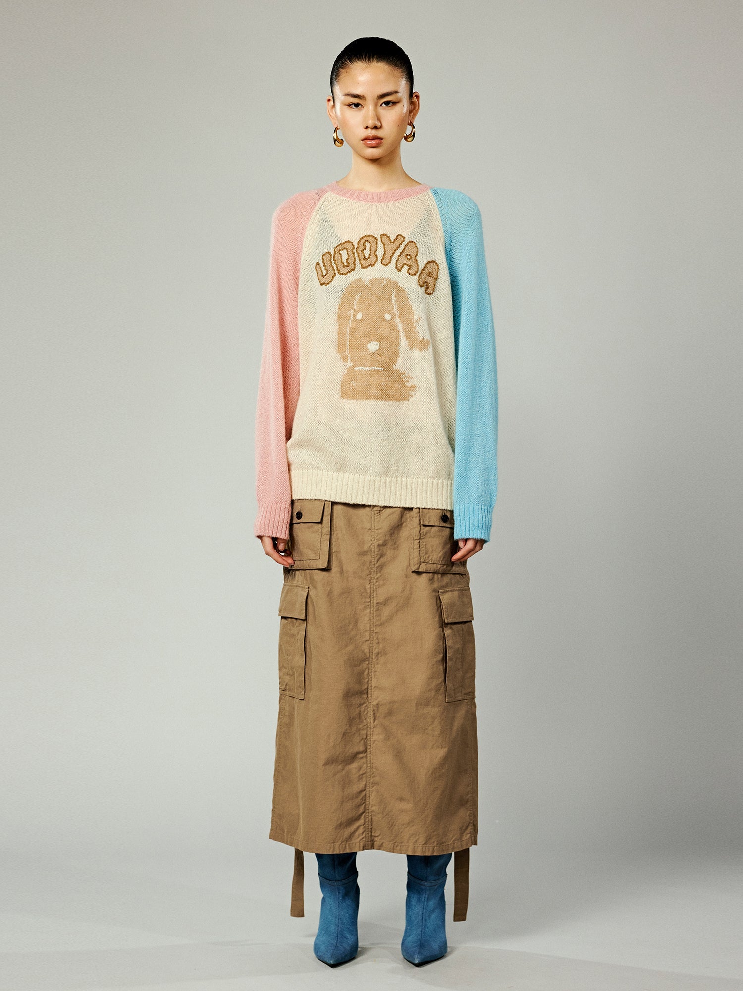 Wind-blown puppy raglan sleeve crewneck sweater