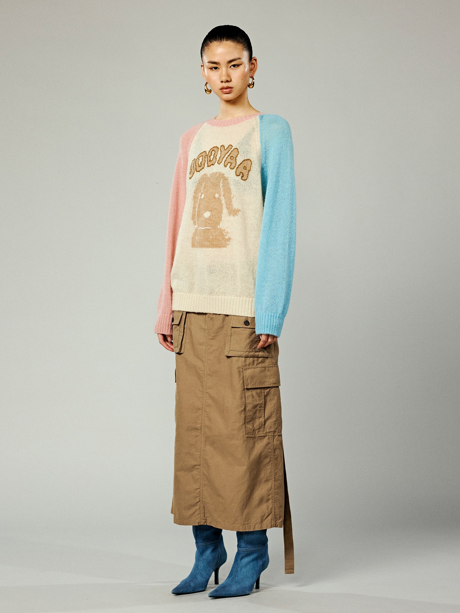 Wind-blown puppy raglan sleeve crewneck sweater