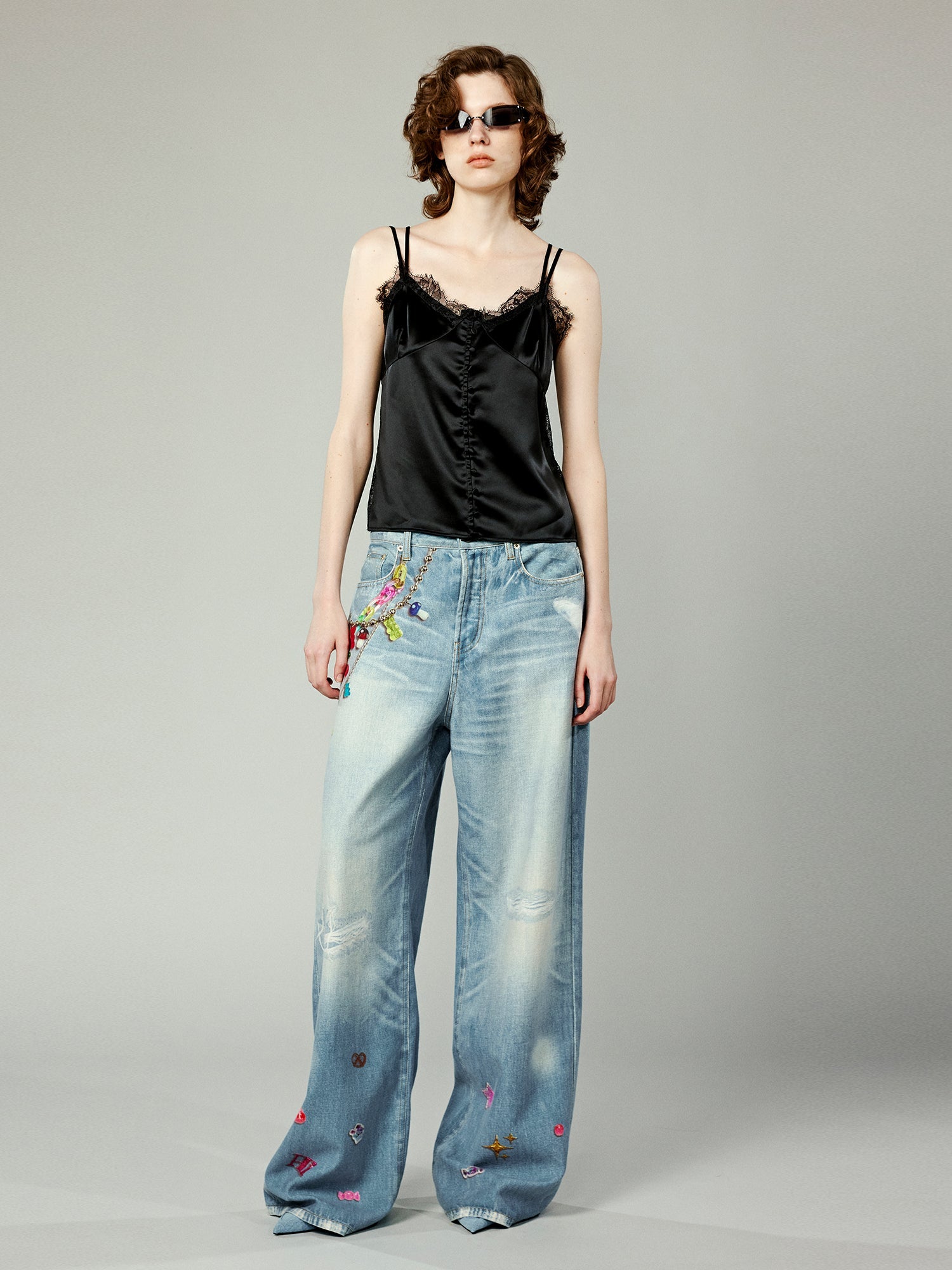 Trompe l'oeil chain print jeans