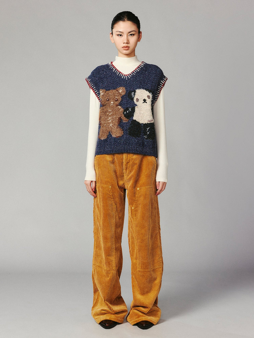 ''Panda and Bear" knitted v-neck sweater vest