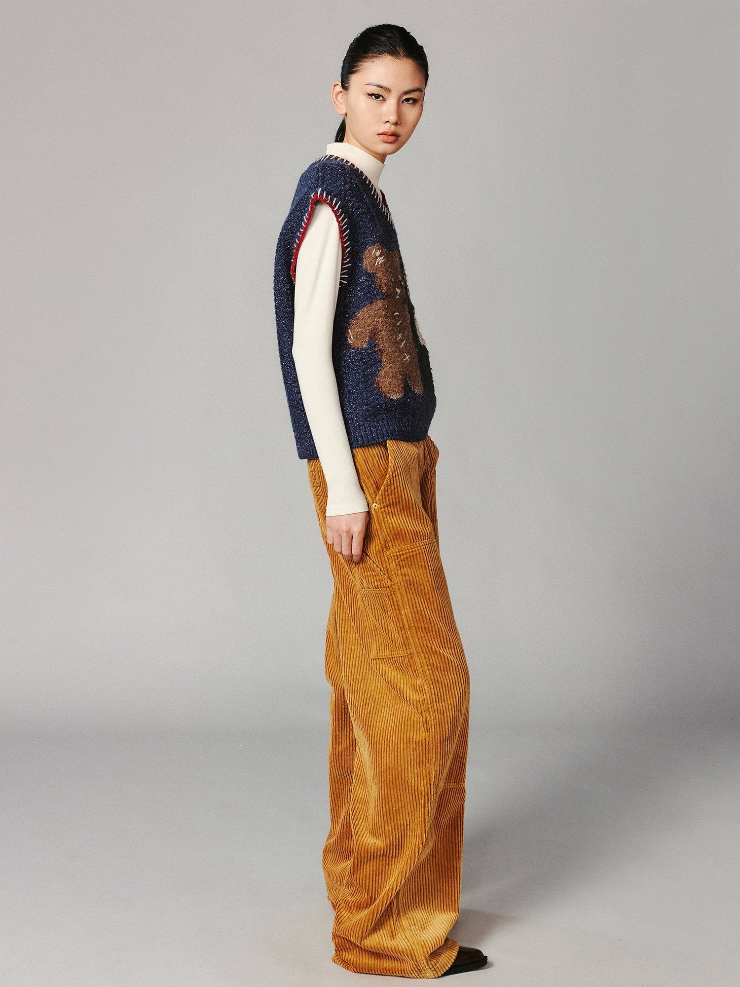 ''Panda and Bear" knitted v-neck sweater vest