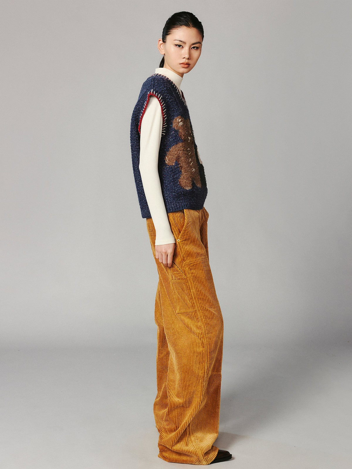 ''Panda and Bear" knitted v-neck sweater vest