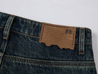 Washed curved blade jeans