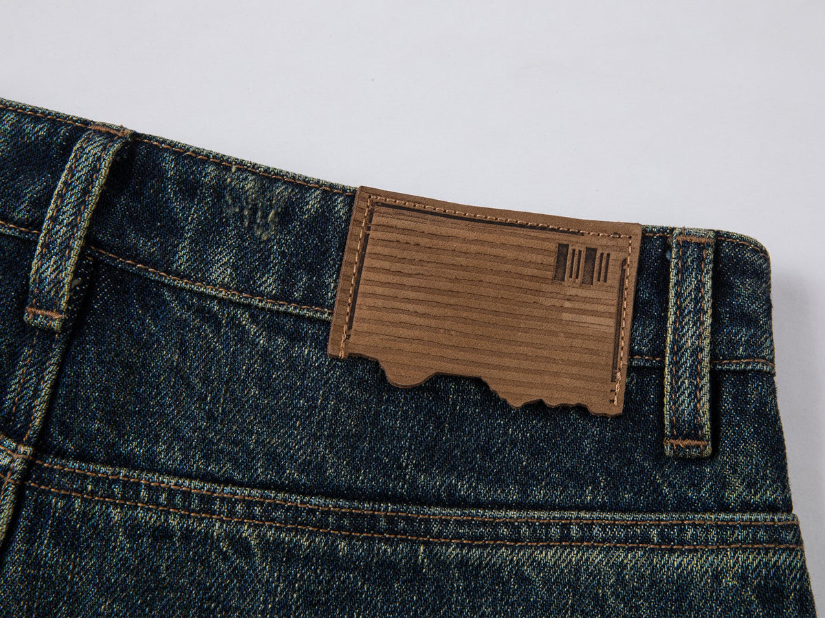 Washed curved blade jeans