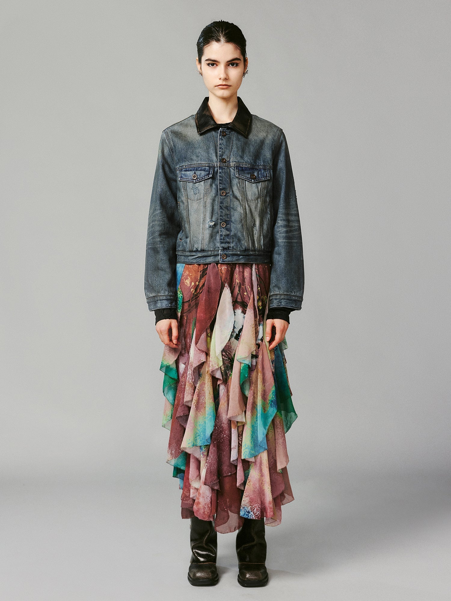 Washed and distressed quilted denim jacket