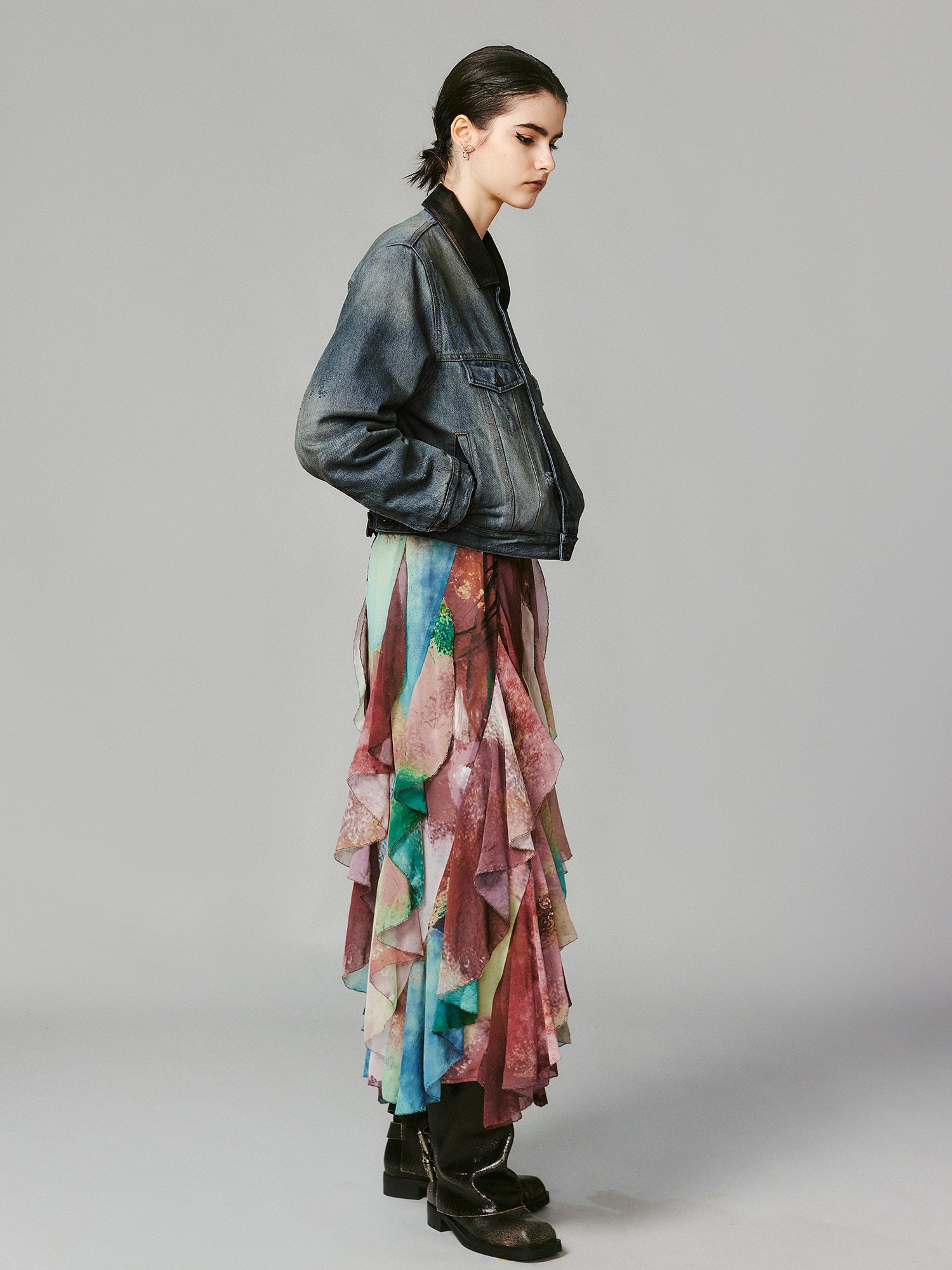 Washed and distressed quilted denim jacket