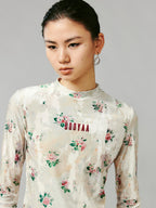 Floral crushed velvet mock-neck top