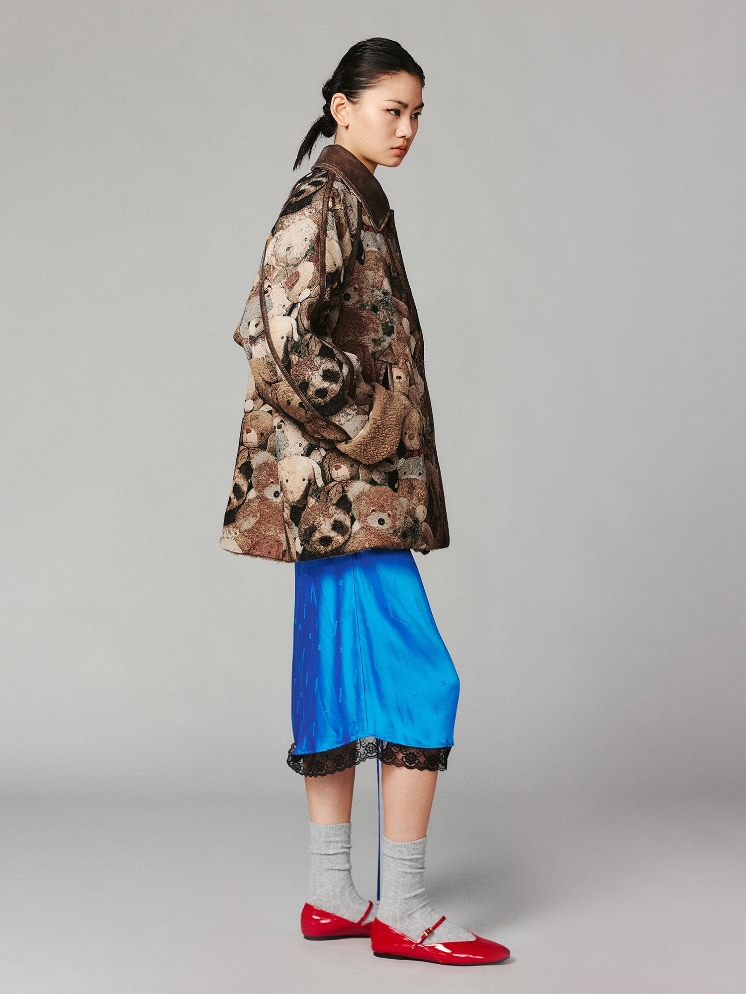 M35 blanket jacket covered with vintage plush toys