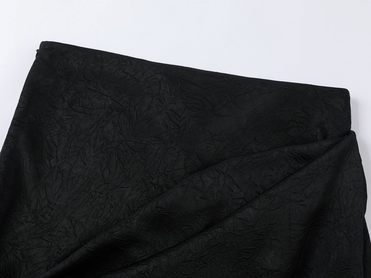 Lace-trimmed skirt with casually lifted hem