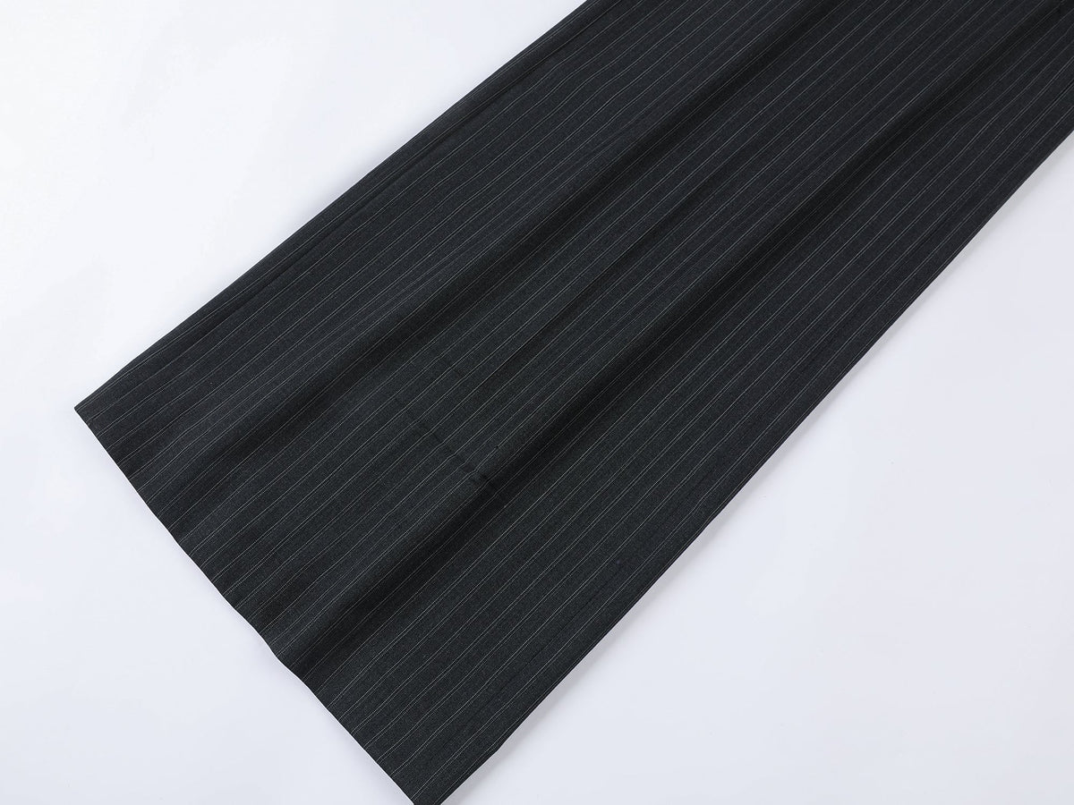 Pulled pleated suit pants with authentic wear marks