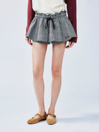 Playful and stylish finely woven plaid mini skirt with a hidden twist