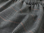 Playful and stylish finely woven plaid mini skirt with a hidden twist
