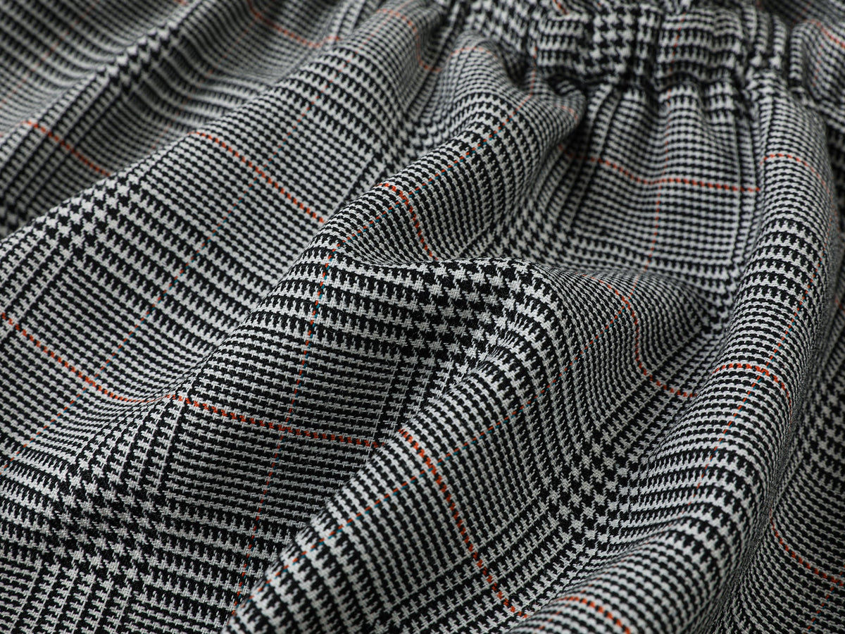 Playful and stylish finely woven plaid mini skirt with a hidden twist