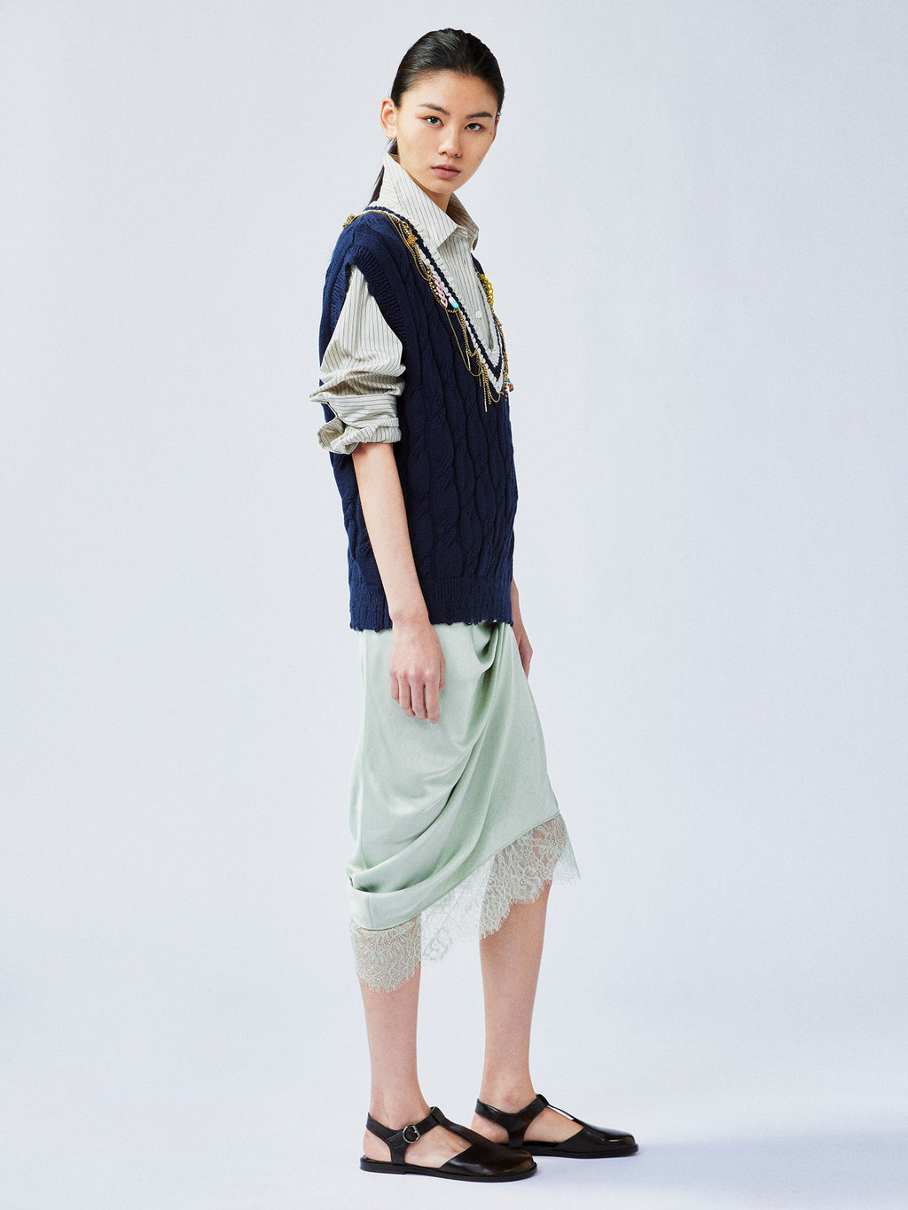 Charmingly playful diamond chain knit vest