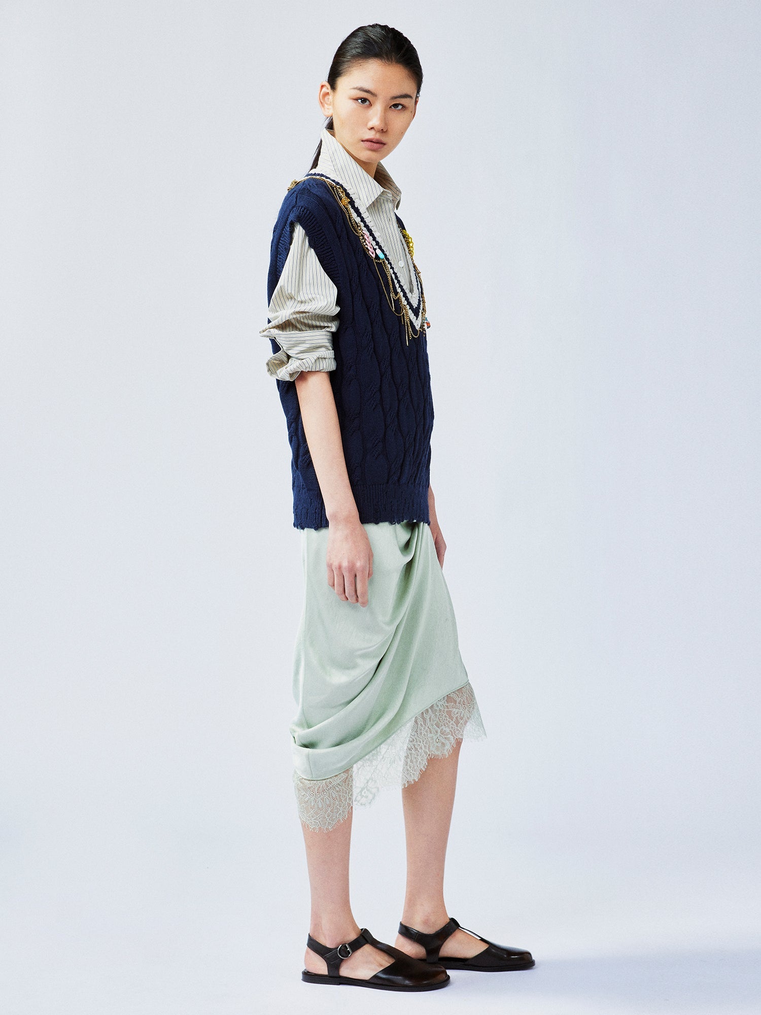 Charmingly playful diamond chain knit vest