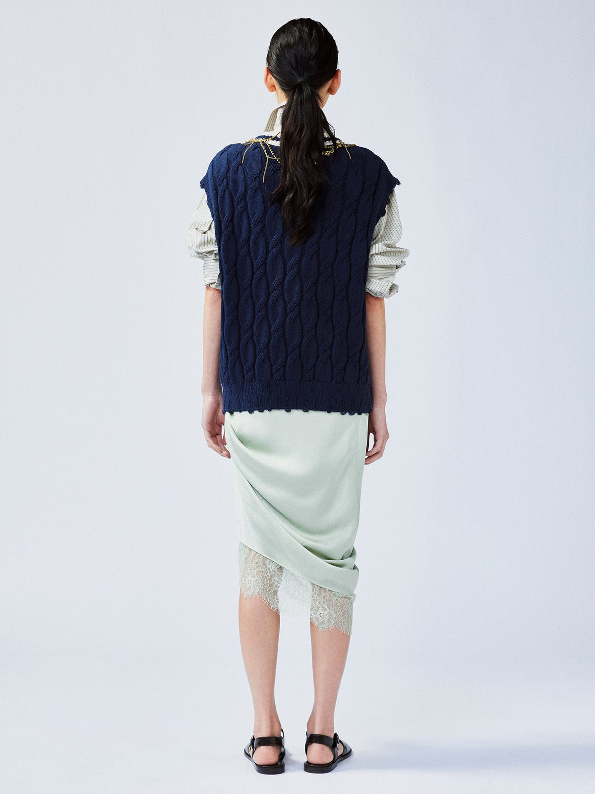 Charmingly playful diamond chain knit vest
