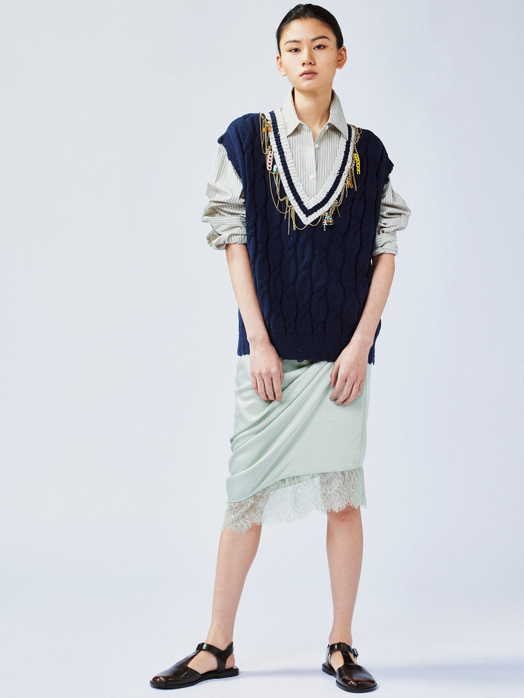 Charmingly playful diamond chain knit vest