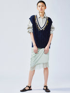 Charmingly playful diamond chain knit vest