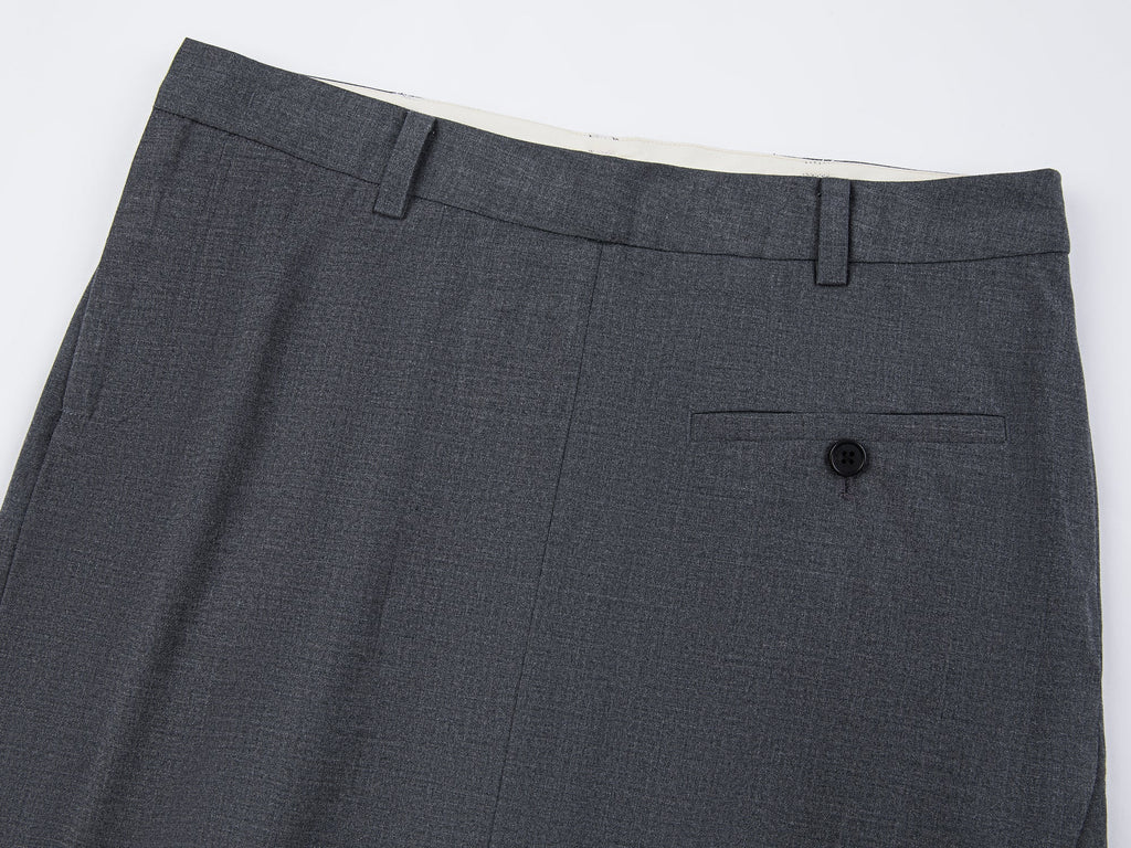 A misaligned suit layered-look skirt