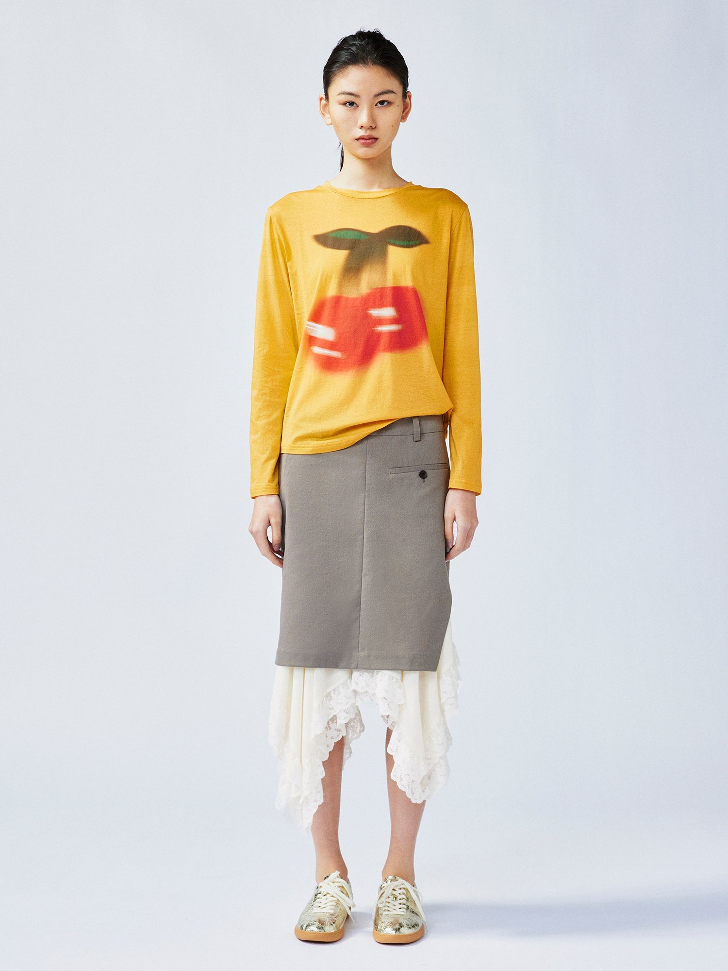 A misaligned suit layered-look skirt