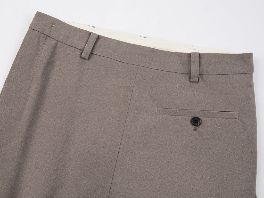 A misaligned suit layered-look skirt