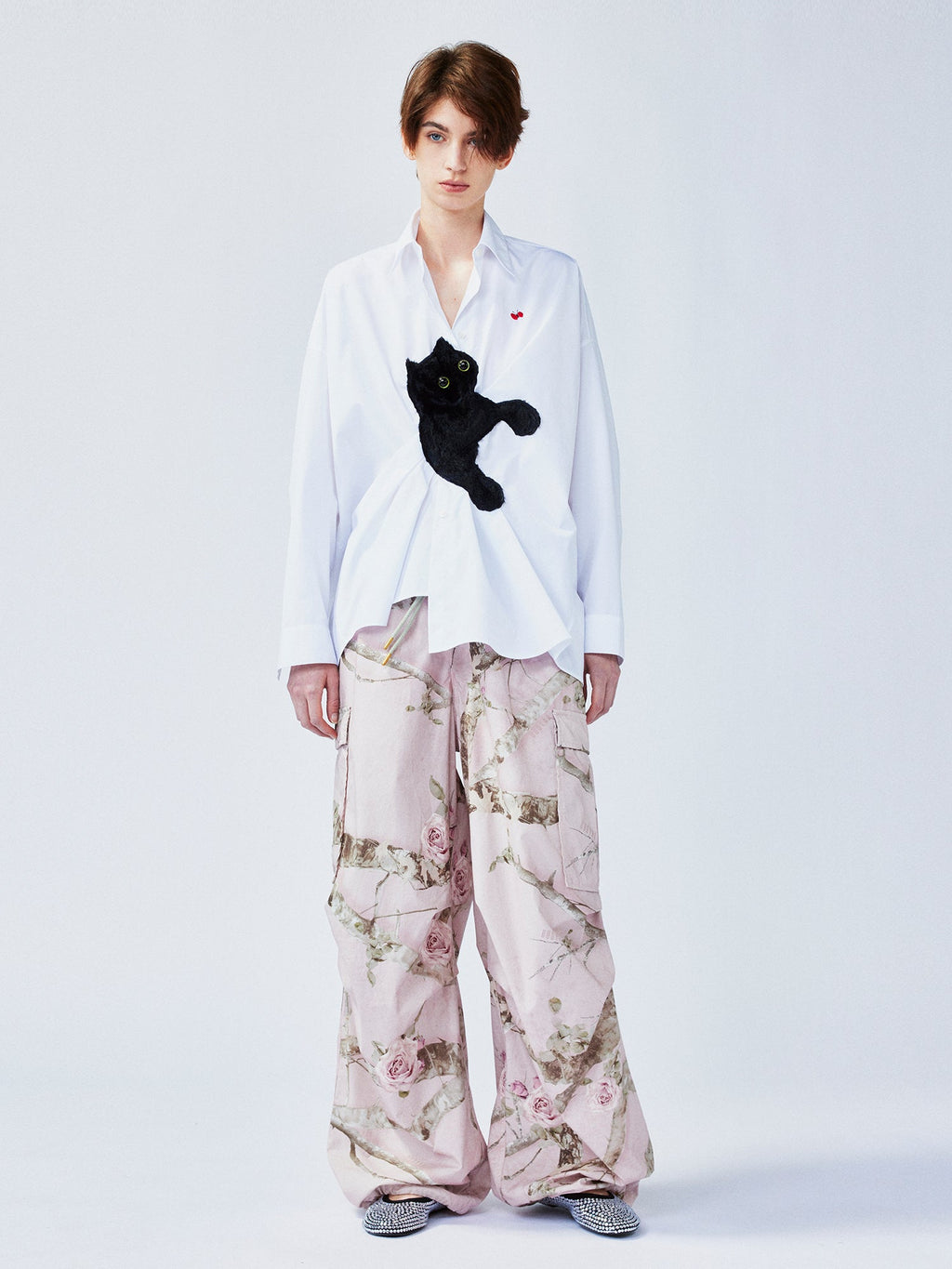 Playful cat chasing butterfly shirt