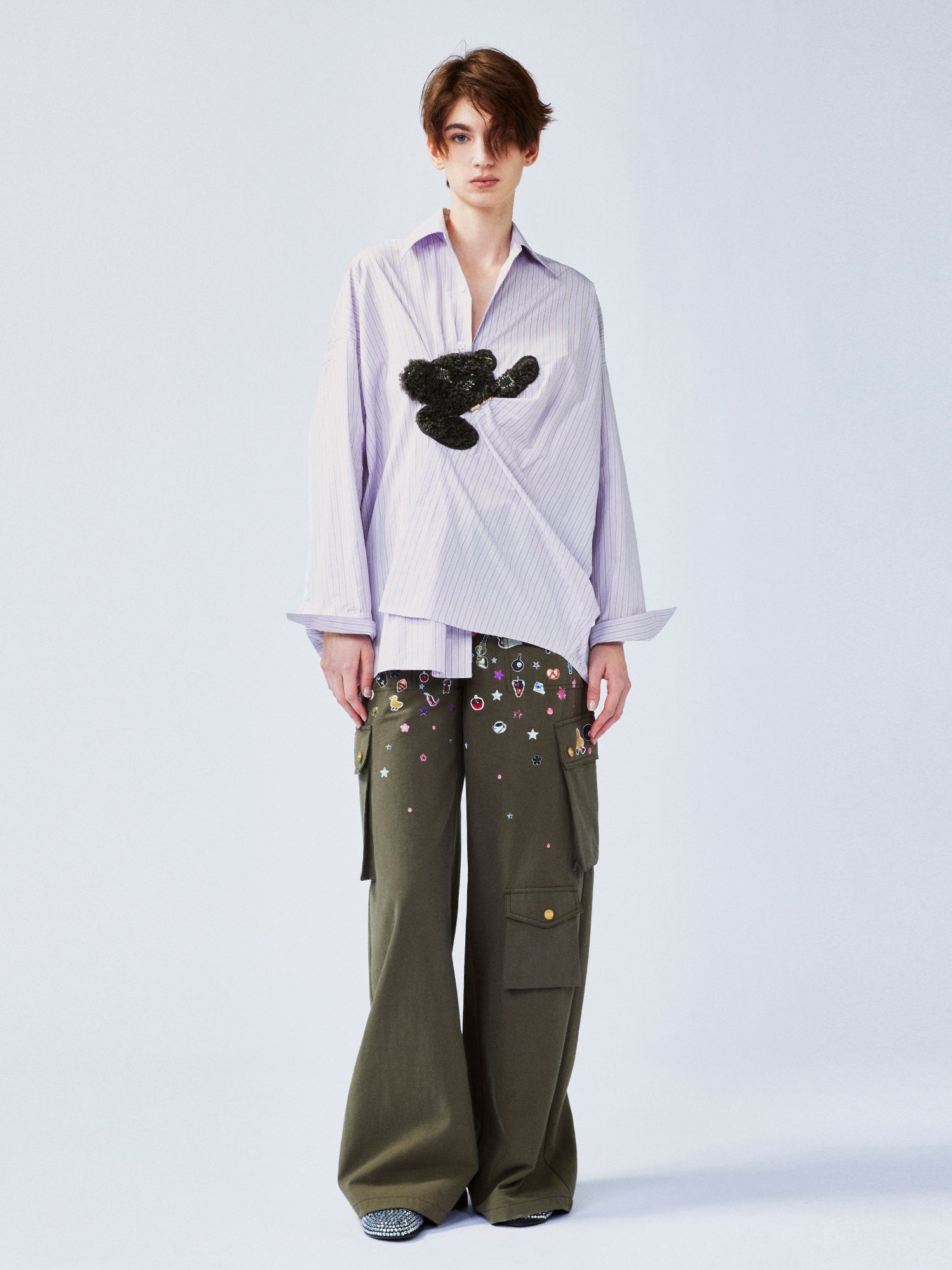 Playful puppy biting shirt