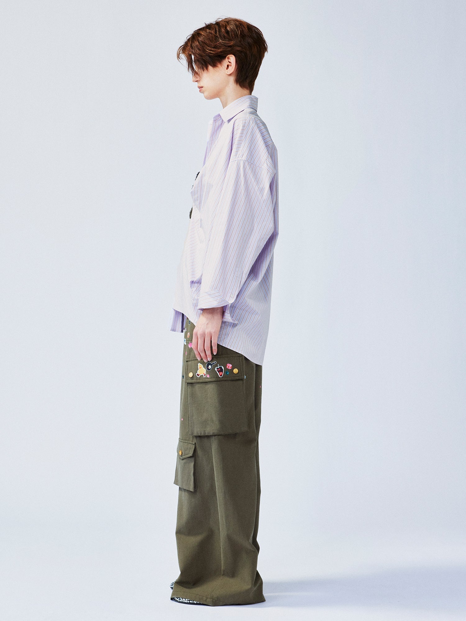 Playful puppy biting shirt