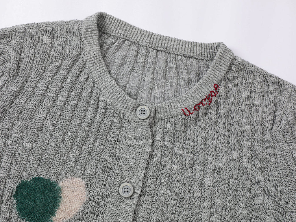 "Playful duck" wool cardigan