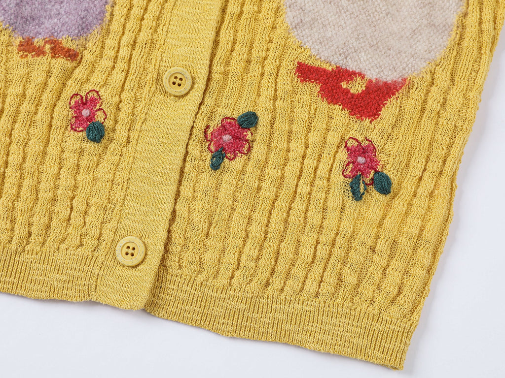 "Playful duck" wool cardigan
