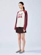 Playful apple worm raglan sleeve T-shirt