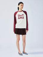 Playful apple worm raglan sleeve T-shirt