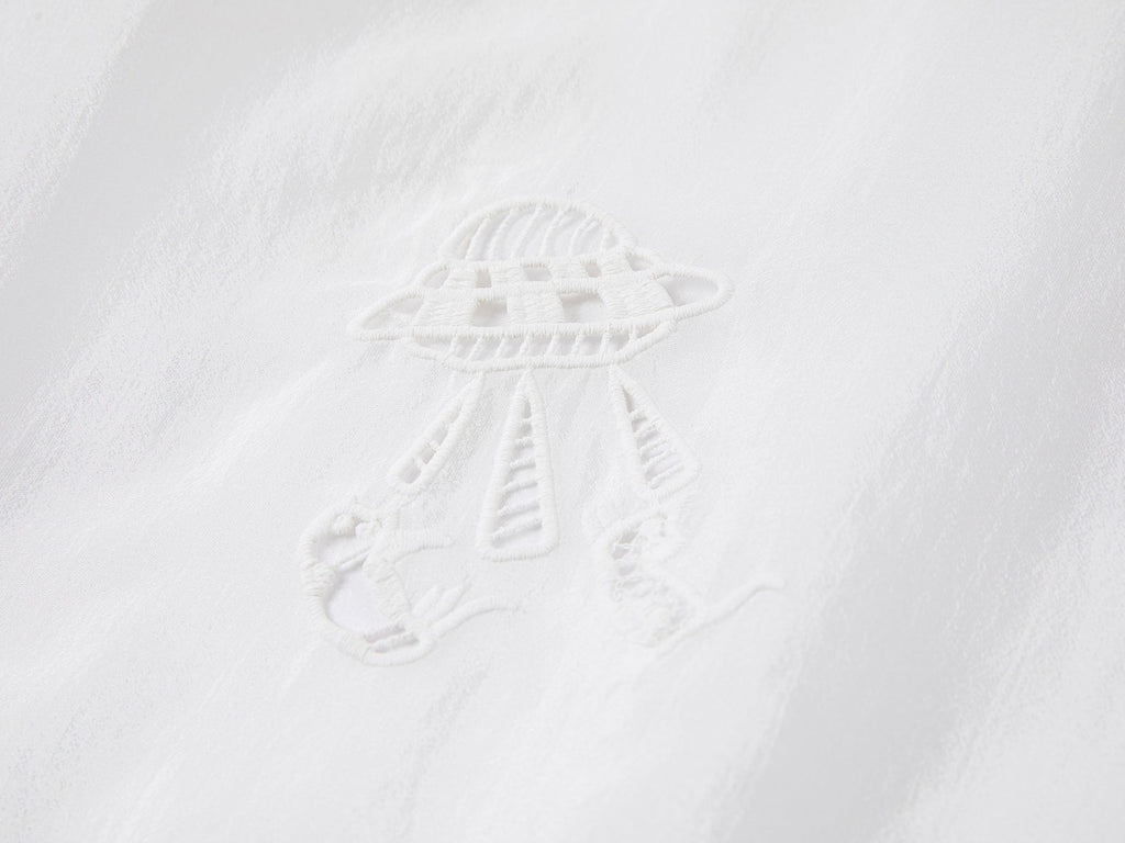 Embroidered cutout hooded shirt