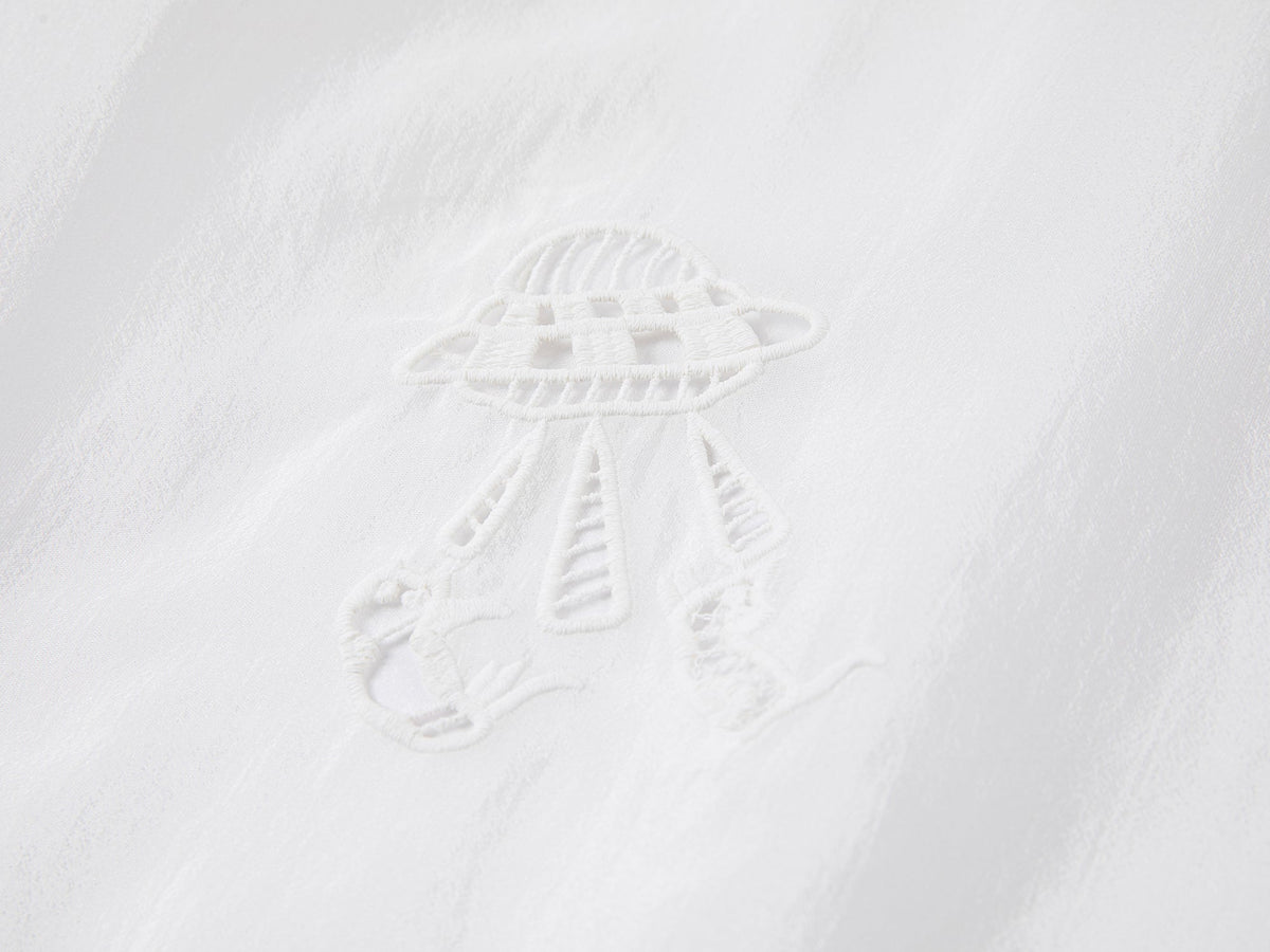 Embroidered cutout hooded shirt