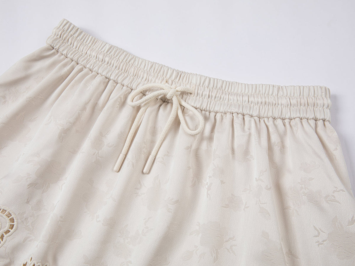 Asymmetrical lace jacquard skirt