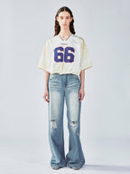 Distressed satin tulip jersey