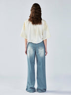 Distressed satin tulip jersey