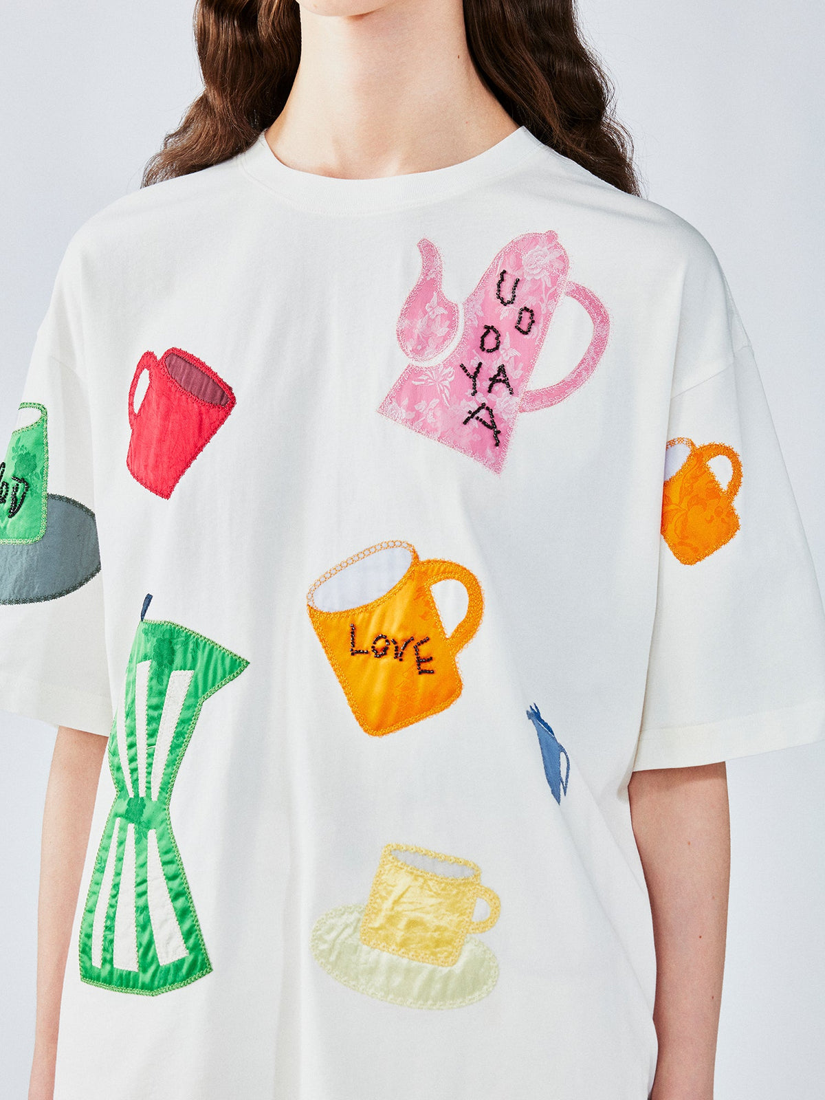 Household object silhouette appliqué t-shirt