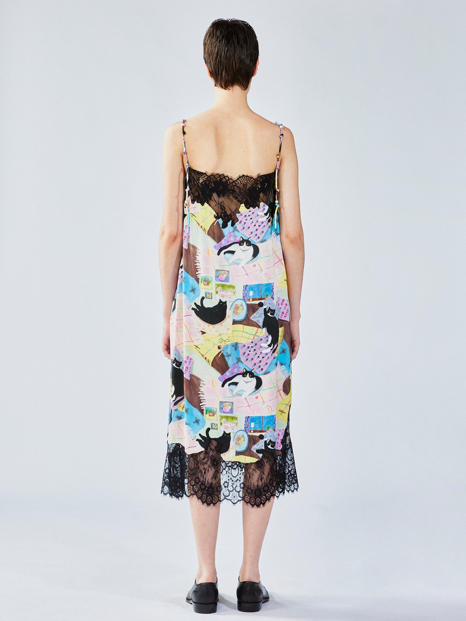 Lace slip dress with cat illustration