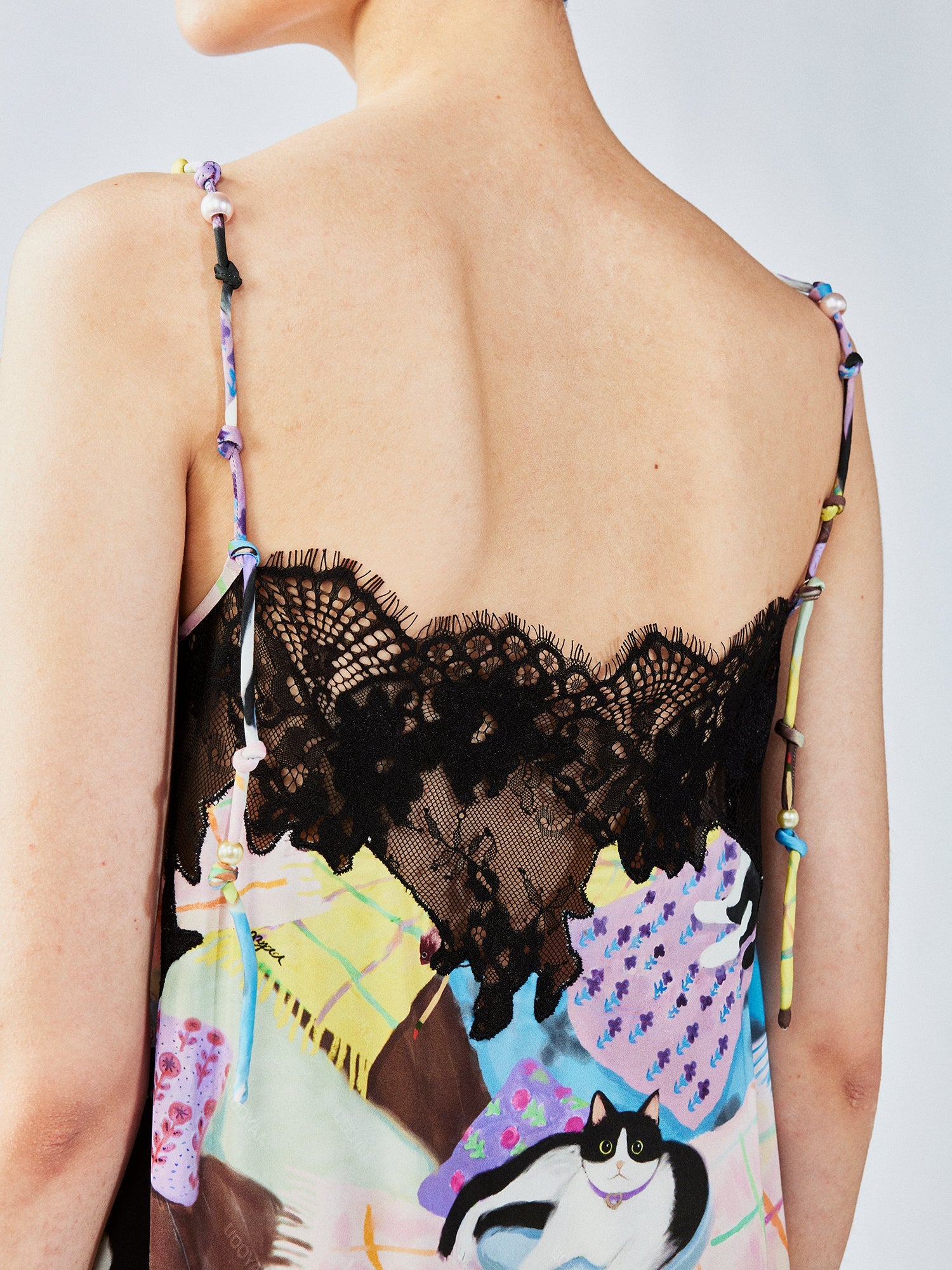 Lace slip dress with cat illustration