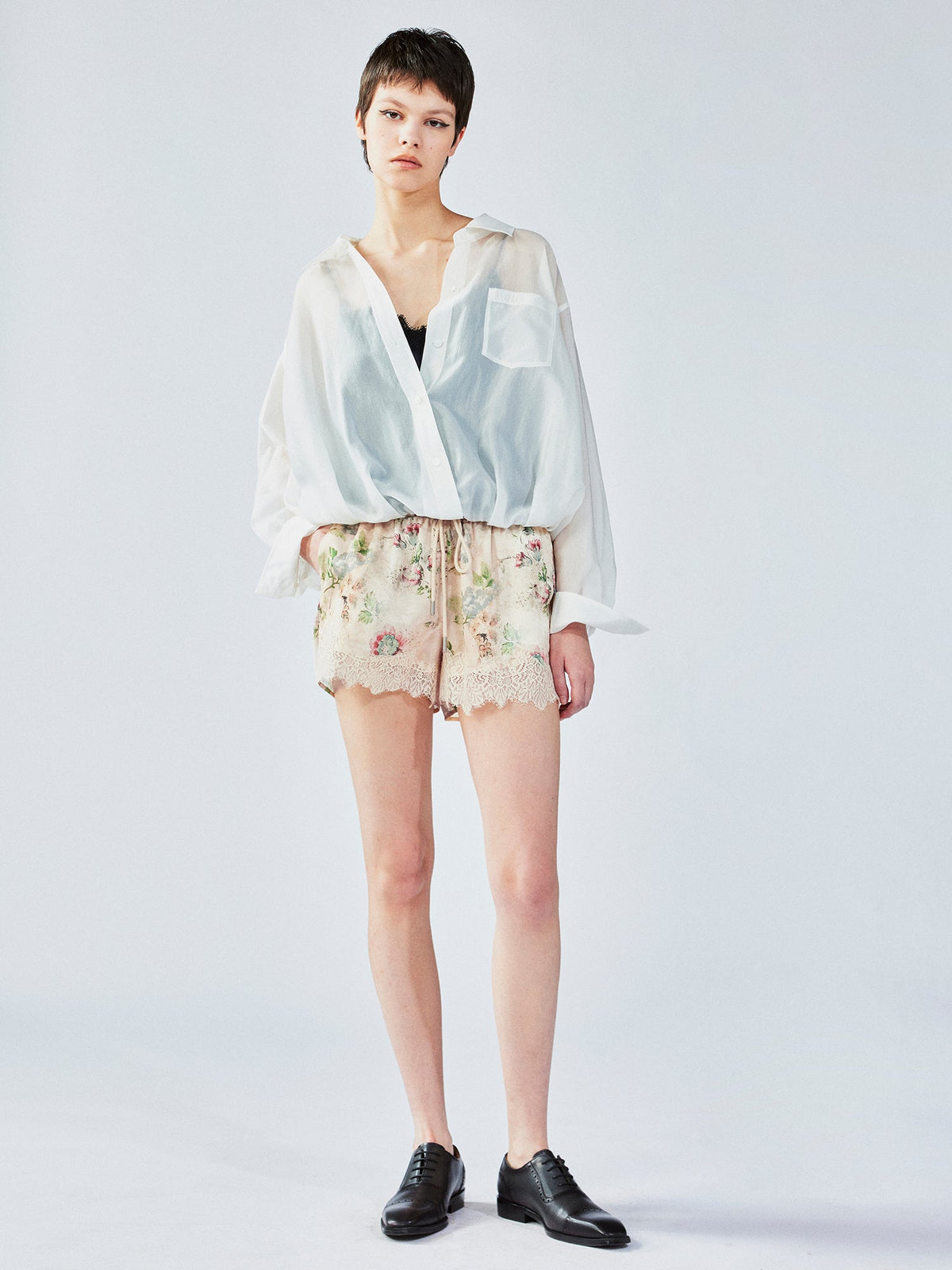 Vintage wallpaper-inspired floral lace shorts