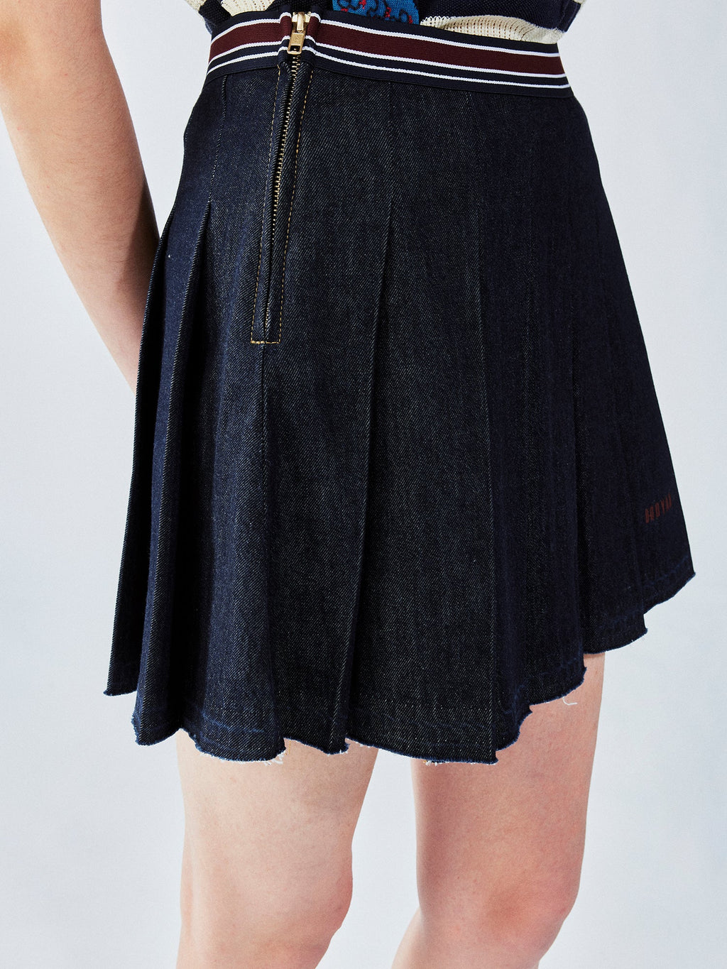 Pleated denim mini skirt